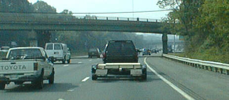 Suburban and trailer on the Beltway