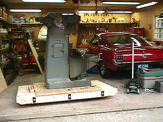 Platform on two pipe rollers, safely in the garage