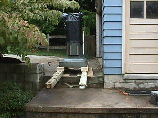 The base prepared to leap down the steps